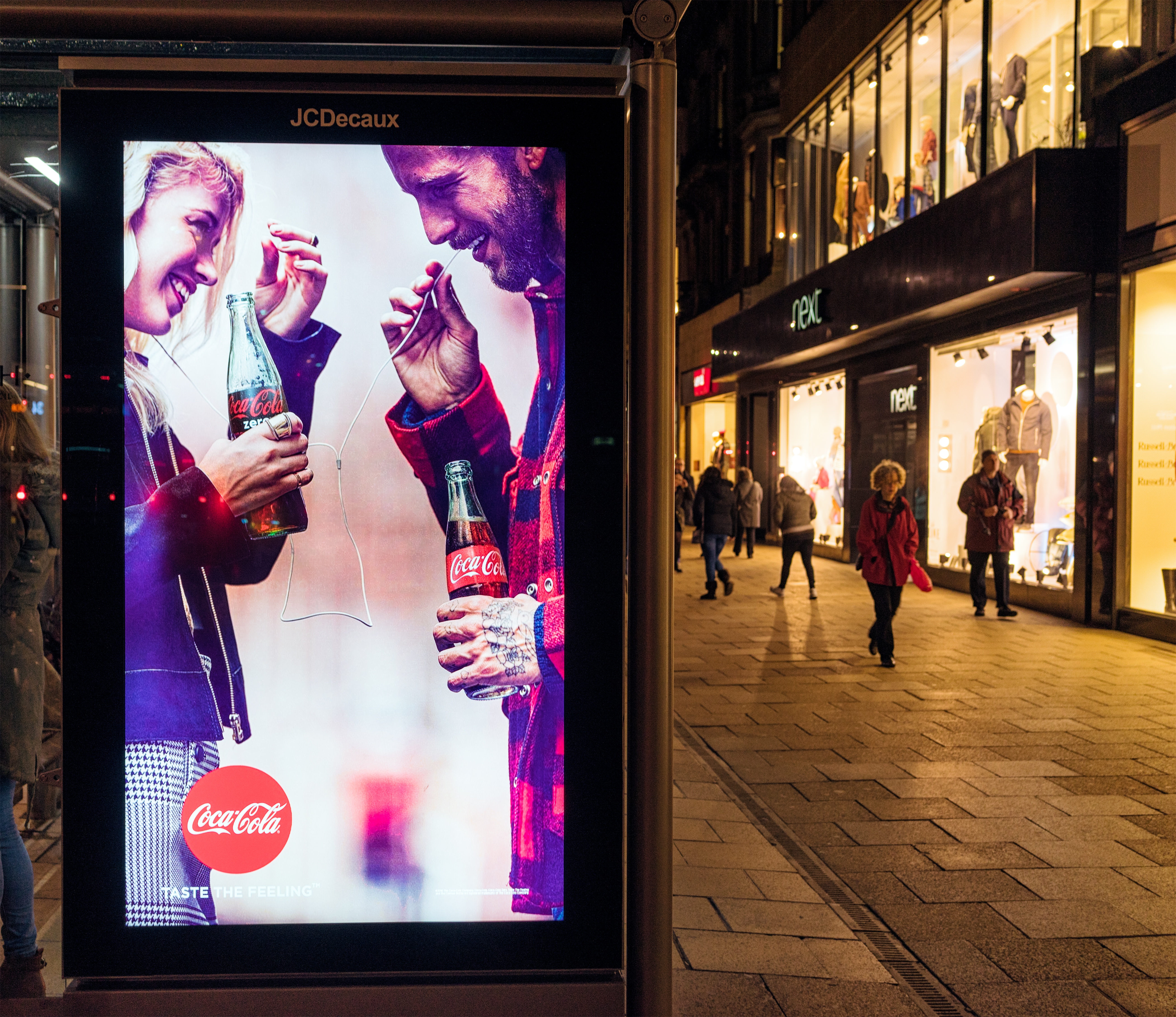 Illuminated-Coca-Cola-advertisement-at-night-507802482_5206x4503